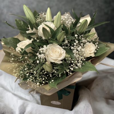 White Roses and lilies - Stunning and pure white lilies and roses with gypsophila and lush greenery