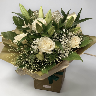 White Roses and lilies - Stunning and pure white lilies and roses with gypsophila and lush greenery