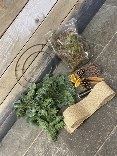 Wreath making kit - Create a beautiful festive wreath at home with our complete wreath making kit, including a wire frame, moss, spruce, ribbon, and natural decorations.